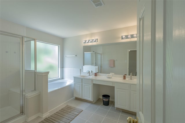 6511 Harcourt Bridge Dr, Houston, TX 77084 - bathroom featuring a stall shower, a bath, double vanity, and tile patterned flooring