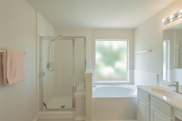 6511 Harcourt Bridge Dr, Houston, TX 77084 - bathroom with a stall shower, vanity, and a garden tub