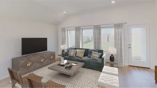 3001 Wild Dunes Dr, Katy, TX 77493 - living area featuring wood finished floors, vaulted ceiling, and recessed lighting