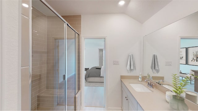 3001 Wild Dunes Dr, Katy, TX 77493 - ensuite bathroom with vanity, a stall shower, and vaulted ceiling