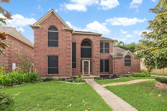3507 Shanemoss Ct, Houston, TX 77068 - traditional-style house featuring brick siding and a front yard