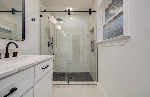 4914 W 43rd St, Houston, TX 77092 - bathroom with vanity, marble look tile flooring, and a marble finish shower