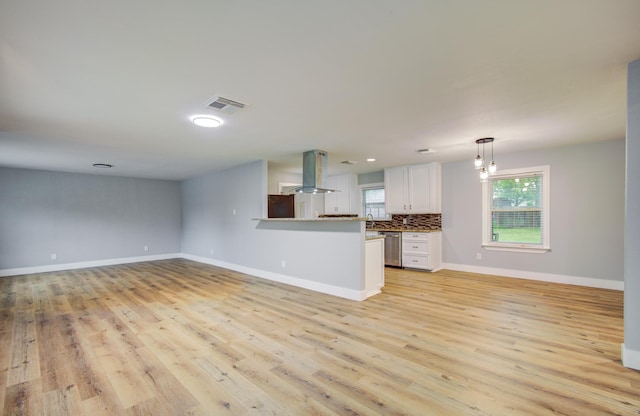 4914 W 43rd St, Houston, TX 77092 - unfurnished living room featuring light wood-style floors and recessed lighting