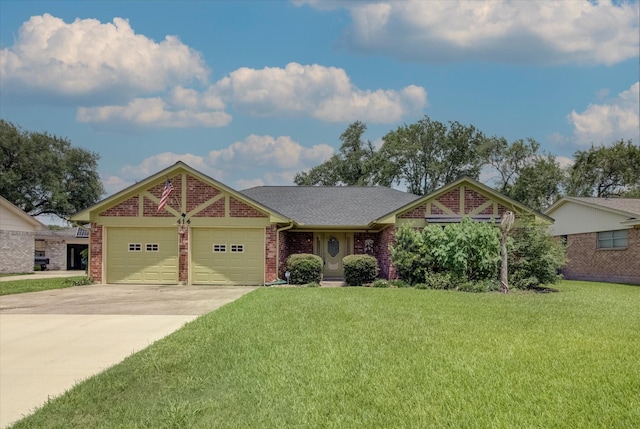 414 Daffodil St, Lake Jackson, TX 77566 - single story home featuring a garage, a front yard, brick siding, and driveway