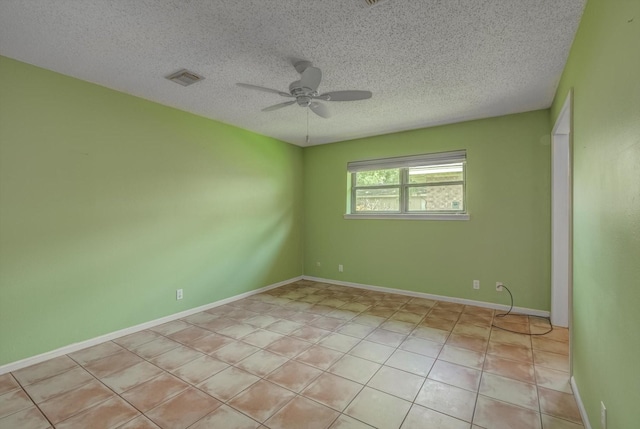 414 Daffodil St, Lake Jackson, TX 77566 - unfurnished room featuring a ceiling fan, a textured ceiling, and light tile patterned floors