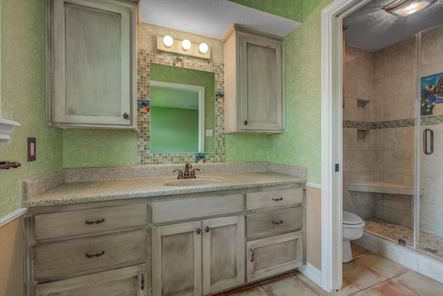414 Daffodil St, Lake Jackson, TX 77566 - full bath featuring vanity, a stall shower, and tile patterned floors