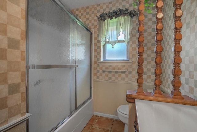 414 Daffodil St, Lake Jackson, TX 77566 - bathroom with tile patterned floors, shower / bath combination with glass door, and vanity