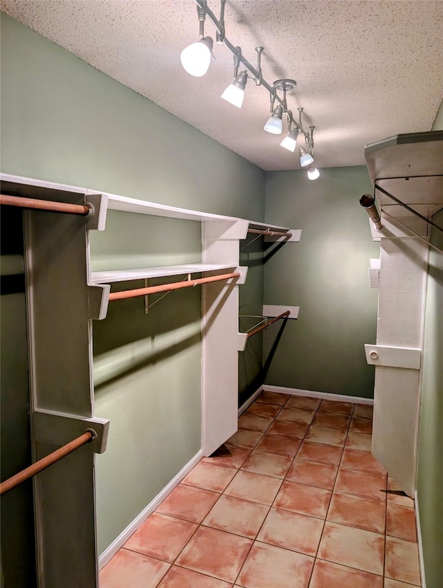 414 Daffodil St, Lake Jackson, TX 77566 - walk in closet featuring light tile patterned flooring