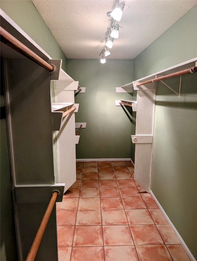 414 Daffodil St, Lake Jackson, TX 77566 - walk in closet with light tile patterned flooring