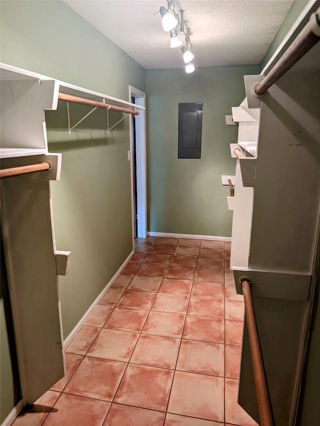 414 Daffodil St, Lake Jackson, TX 77566 - walk in closet featuring electric panel and light tile patterned flooring