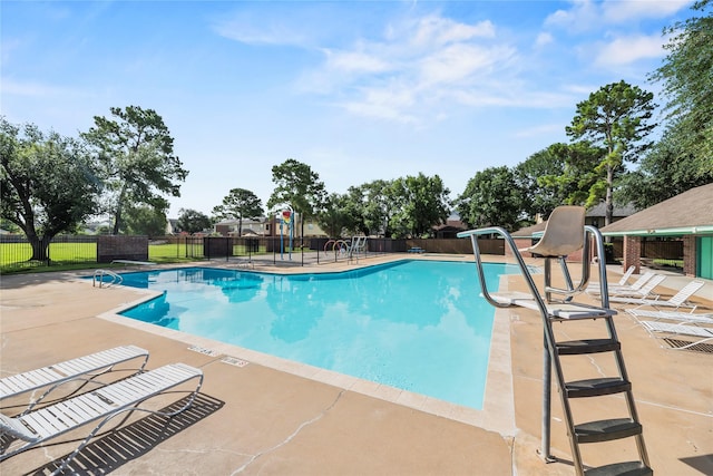 7331 Hazel Cove Dr, Houston, TX 77095 - community pool featuring a patio area