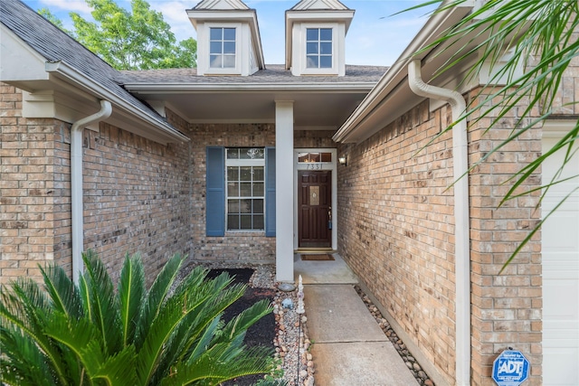 7331 Hazel Cove Dr, Houston, TX 77095 - entrance to property featuring brick siding and roof with shingles