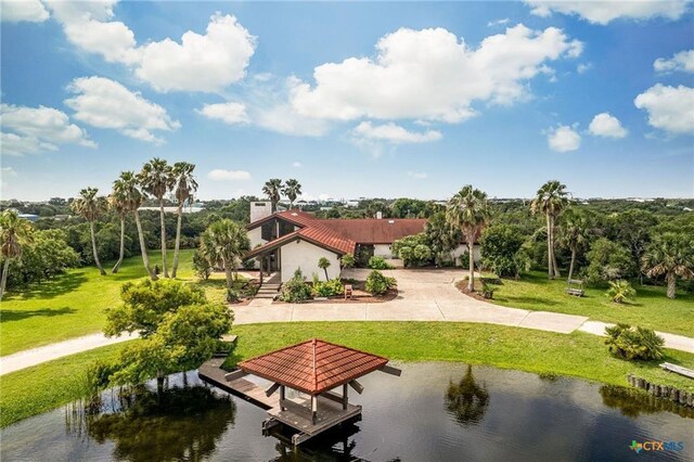 1809 W Harrison Ave, Port O Connor, TX 77982 - view of community featuring a water view, a yard, and a boat dock