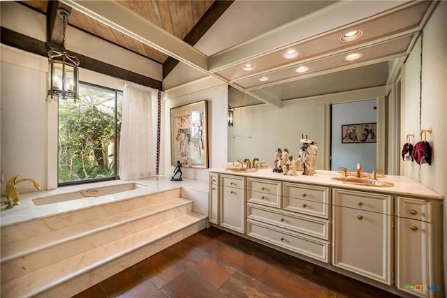 1809 W Harrison Ave, Port O Connor, TX 77982 - bathroom with double vanity, a bath, recessed lighting, and wood ceiling