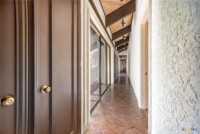 1809 W Harrison Ave, Port O Connor, TX 77982 - hall with brick floors and beamed ceiling