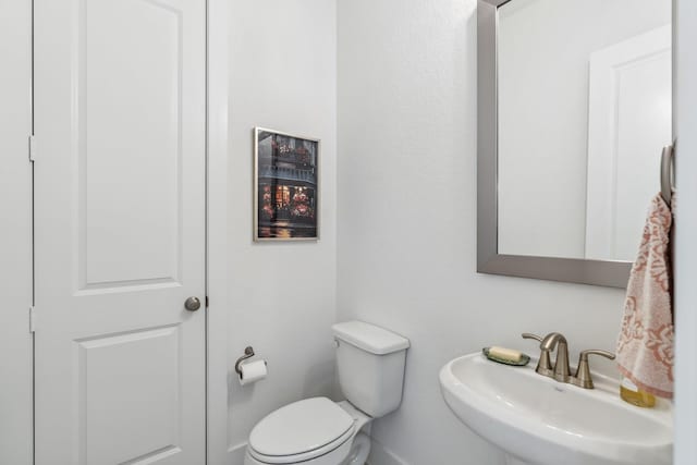 21514 Sunny Riverbank Cir, Cypress, TX 77433 - bathroom with a sink and toilet