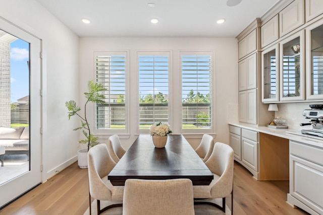 21514 Sunny Riverbank Cir, Cypress, TX 77433 - dining area featuring light wood-type flooring and recessed lighting