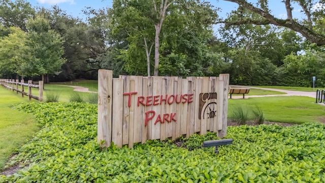 21514 Sunny Riverbank Cir, Cypress, TX 77433 - community sign with view of scattered trees