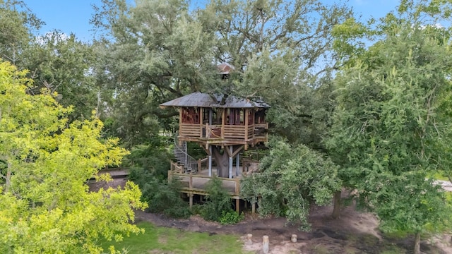 21514 Sunny Riverbank Cir, Cypress, TX 77433 - rear view of property featuring a deck, stairway, and log exterior