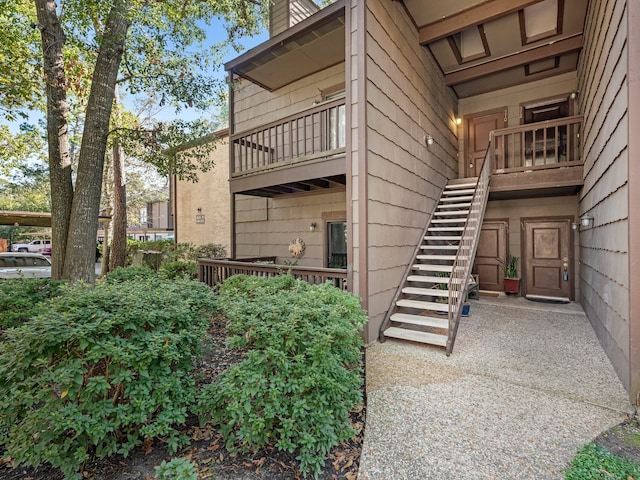 11711 Memorial Dr Unit 570, Houston, TX 77024 - view of building exterior with stairs