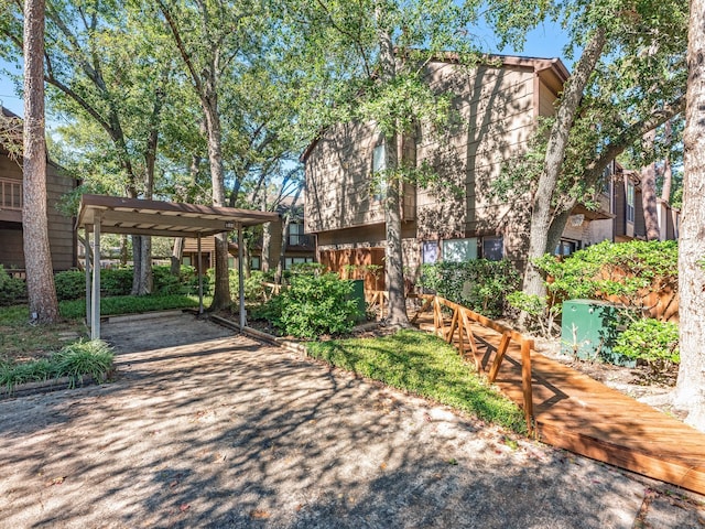11711 Memorial Dr Unit 570, Houston, TX 77024 - view of front of property featuring a detached carport