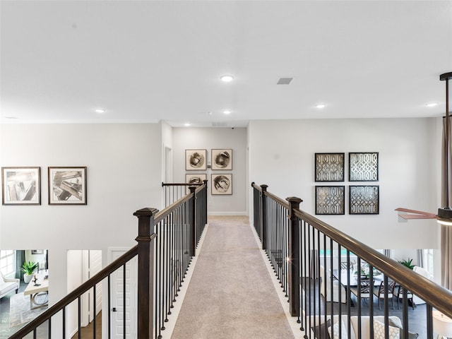 9227 Heckenberg Arbor Ln, Cypress, TX 77433 - corridor with an upstairs landing, recessed lighting, and light carpet