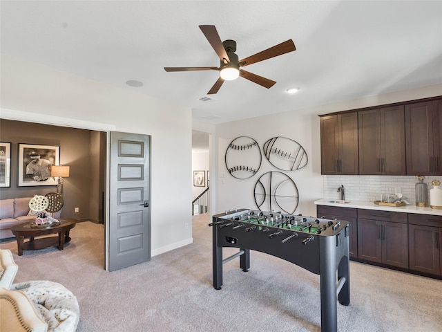 9227 Heckenberg Arbor Ln, Cypress, TX 77433 - rec room featuring ceiling fan and light colored carpet