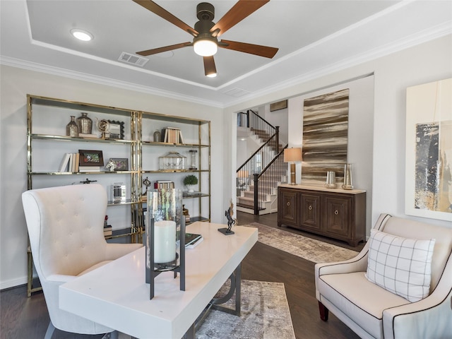 9227 Heckenberg Arbor Ln, Cypress, TX 77433 - living area with ceiling fan, stairs, a desk, ornamental molding, and dark wood-style floors