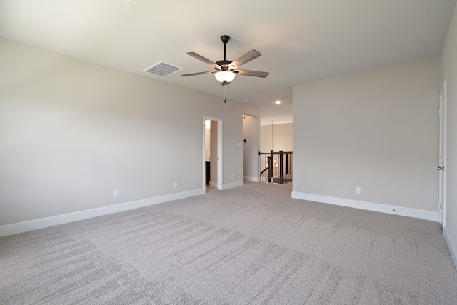 916 Wormwood Dr, League City, TX 77573 - unfurnished room with ceiling fan, light colored carpet, and recessed lighting
