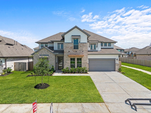 916 Wormwood Dr, League City, TX 77573 - view of front of home with stucco siding, concrete driveway, a shingled roof, and a garage