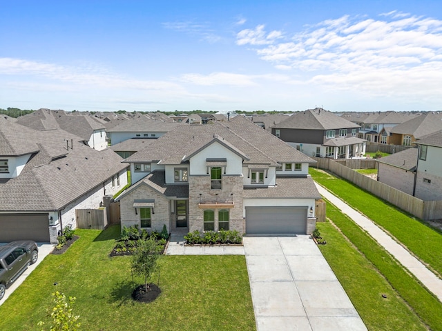916 Wormwood Dr, League City, TX 77573 - view of front of home with a residential view, stucco siding, driveway, roof with shingles, and stone siding