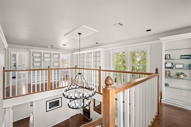 208 W 34th St, Houston, TX 77018 - hallway featuring an upstairs landing, a chandelier, and dark wood-type flooring