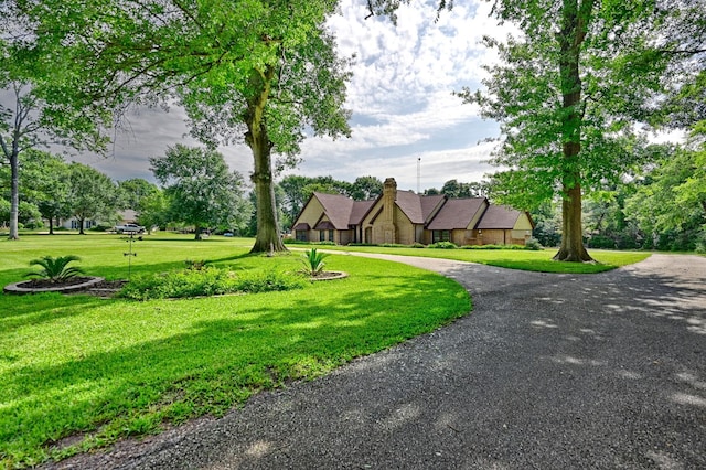 1950 Country Club Rd, Brenham, TX 77833 - view of property's community featuring a lawn