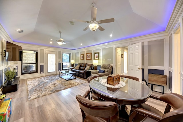 1950 Country Club Rd, Brenham, TX 77833 - living room with a tray ceiling, ceiling fan, wood finished floors, and lofted ceiling