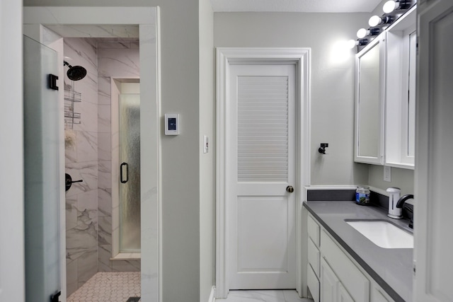 1950 Country Club Rd, Brenham, TX 77833 - bathroom featuring marble finish flooring, a marble finish shower, and vanity