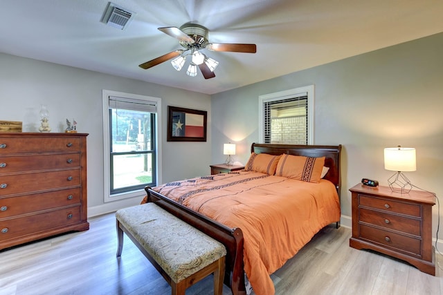 1950 Country Club Rd, Brenham, TX 77833 - bedroom featuring light wood-style flooring and a ceiling fan