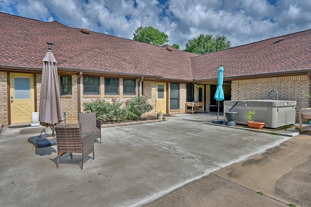 1950 Country Club Rd, Brenham, TX 77833 - view of patio with a hot tub