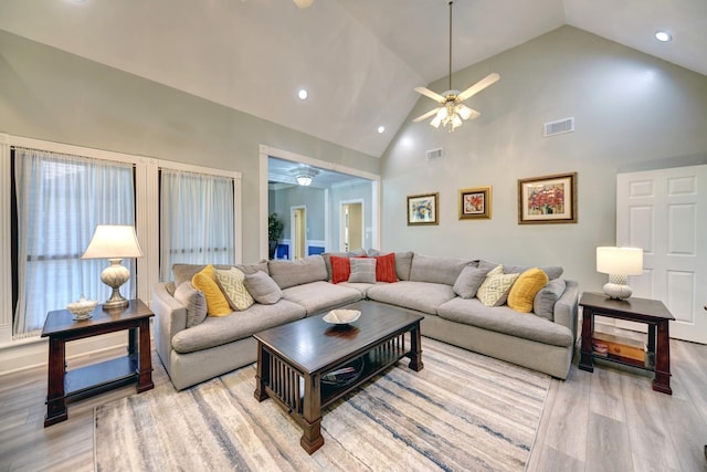 1950 Country Club Rd, Brenham, TX 77833 - living room with a ceiling fan, light wood finished floors, high vaulted ceiling, and recessed lighting