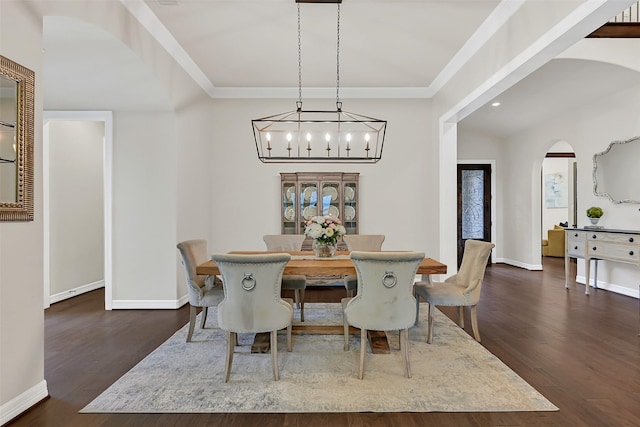 1107 Rymers Switch Ln, Friendswood, TX 77546 - dining area featuring arched walkways, dark wood-style flooring, a chandelier, and recessed lighting