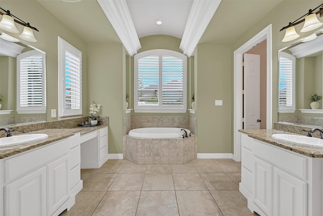 1107 Rymers Switch Ln, Friendswood, TX 77546 - bathroom featuring a garden tub, two vanities, and tile patterned floors