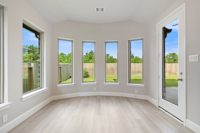 910 Hooks Trl, League City, TX 77573 - unfurnished sunroom with lofted ceiling and wood finished floors