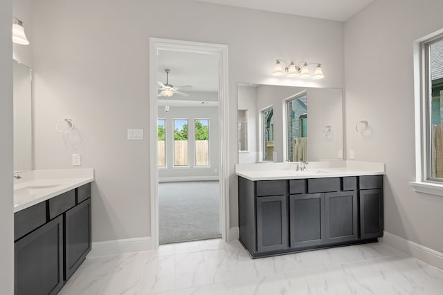 910 Hooks Trl, League City, TX 77573 - bathroom featuring two vanities, marble finish flooring, a ceiling fan, and a shower