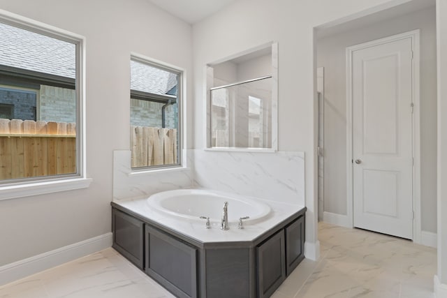 910 Hooks Trl, League City, TX 77573 - bathroom with marble finish flooring, a bath, and a shower