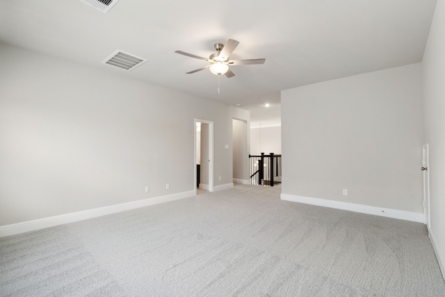 910 Hooks Trl, League City, TX 77573 - spare room with a ceiling fan and light colored carpet