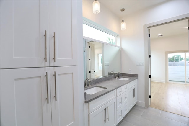 510 E 37th St, Houston, TX 77022 - full bathroom with double vanity and tile patterned flooring