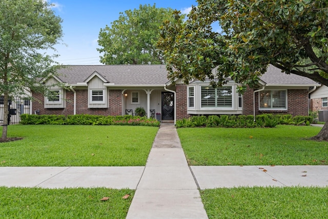 3006 Ann Arbor Dr, Houston, TX 77063 - ranch-style home with a front lawn, brick siding, and a shingled roof