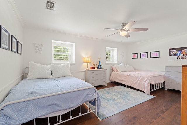 3006 Ann Arbor Dr, Houston, TX 77063 - bedroom featuring ornamental molding, multiple windows, hardwood / wood-style floors, and a ceiling fan