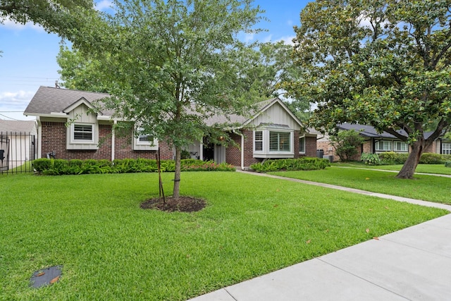 3006 Ann Arbor Dr, Houston, TX 77063 - ranch-style house with brick siding, board and batten siding, and roof with shingles