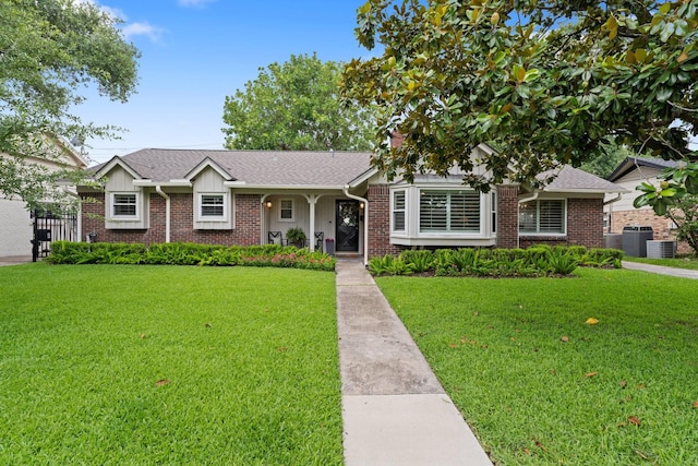 3006 Ann Arbor Dr, Houston, TX 77063 - view of front of house featuring a front lawn and brick siding