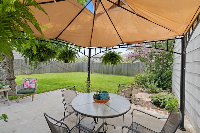 3006 Ann Arbor Dr, Houston, TX 77063 - fenced backyard featuring outdoor dining area, a patio area, and a gazebo